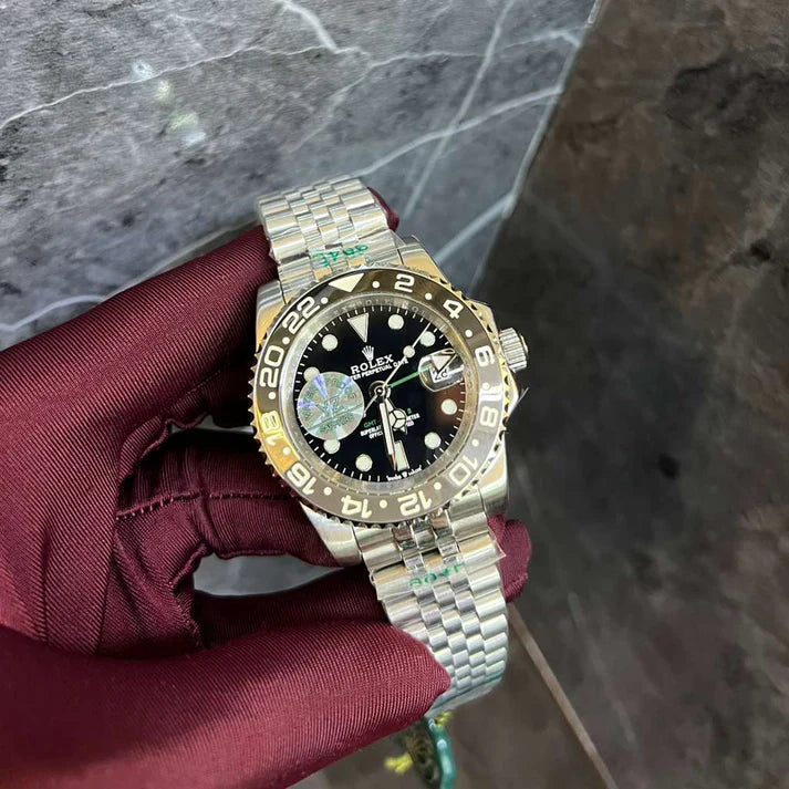 Rolex GMT-Master II "Bruce Wayne" Ref. 126710GRNR with a Black Dial and a Jubilee Bracelet